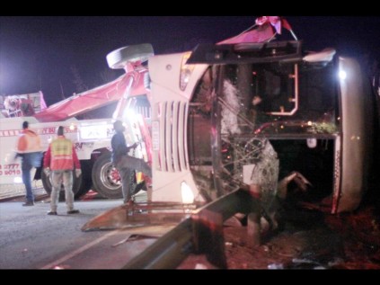 PHOTO: Larry BentleyThe bus on its side before being recovered on Sunday evening