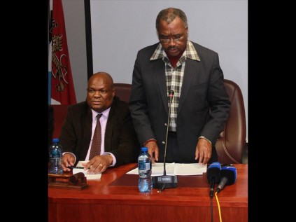 Transport MEC Willies Mchunu addresses the relatives, friends and officials affected by the bus accident in which 10 people lost their lives, in the uMlalazi Council Chambers in eShowe with uMlalazi mayor cllr TB Zulu listening attentively