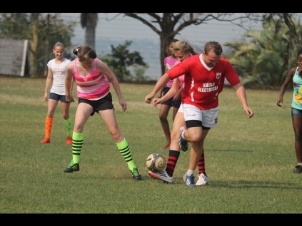 Keana Smit managed to dislodge the ball right from under Hennie Swarts' feet and straight into her team mate Kaylee Laurens' path during the U13A Heuwelland girls' soccer clash against the teachers on Friday morningPHOTOS: Richard Springorum