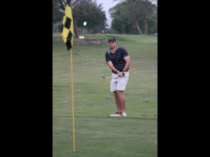 Jandri Kraftt chips for a birdie on the 9th hole after a solid round