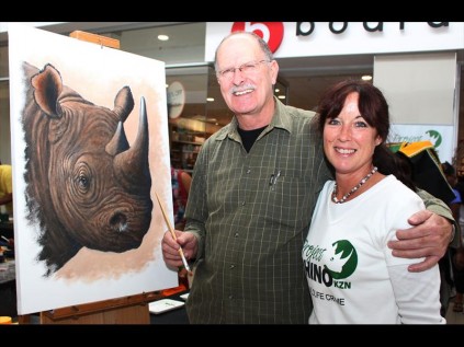 Exhibiting his talent was local wildlife artist Joe Marais, seen with Sheelagh Antrobus of Project Rhino KZN