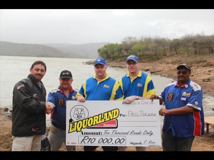 Paul Pereira is congratulated by eShowe Liquorland owner Tony Rose while Liquorland representatives Brad Webster, Kevin Timms and Alvin Madhanlall hold the winner's cheque of R10 000 for the largest bassPHOTOS: Larry Bentley