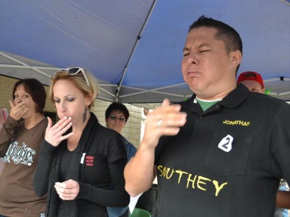 Shantelle Snyman, Bernice Marx and Jonathan Roux battle it out to finish a tray of 'chicken hearts'