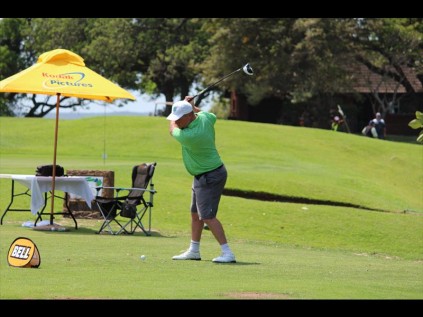 With barely any vision, disabled golfer Johan Kotze has to be helped to line up his shot, but once in place he matches any golfer with normal sight