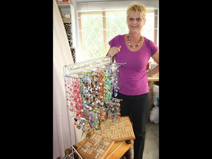 Vera Sansbury with some of her creative beaded jewellery