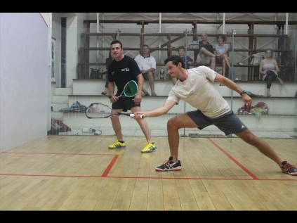 Tiaan van Wyk stretches for a return shot as Stephen Sissison watches intensely during their Zululand Championship final encounter on WednesdayPHOTOS: Richard Springorum