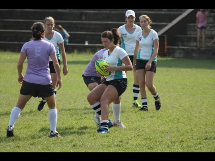Roxanne Walmsley of Bar Reign carries the ball into contact during their semi final clash against Tiny Bubbles 