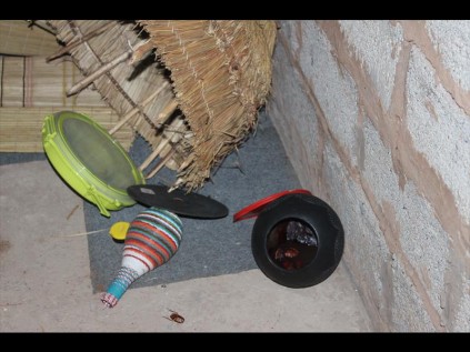 A traditional bowl (ukhamba) with muthi and blood inside was found by police inside the room of the arrested suspect.