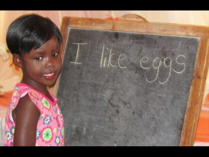 Kwanele Nsibande shows off her reading skills at the Amangwe Crèche graduation on Tuesday