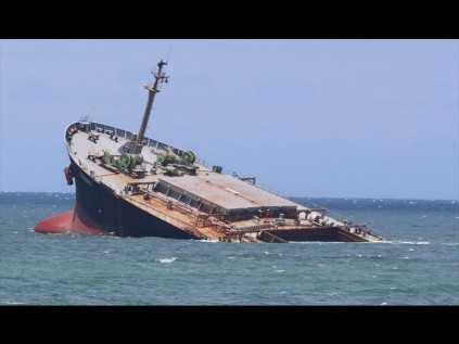 All that is visible of the stricken coal carrier MV Smart, which ran aground off the port entrance during a fierce storm on 19 August 2013 PHOTO: Dave Savides