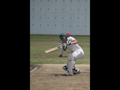 KZNCD batsmen Neil Jordan smashes one for four during his innings against Mpumalanga Rural Districts on Saturday at Addison Park, Empangeni PHOTOS: Richard Springorum