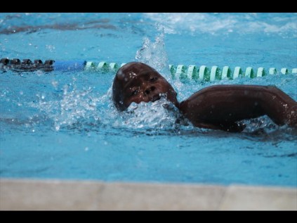 uShaka swimmer Mphathi Mthethwa cruised through his 100m freestyle event on Saturday at the NKZN Age Group Gala at the Arboretum town pool. See full story on page 22PHOTO: Richard Springorum