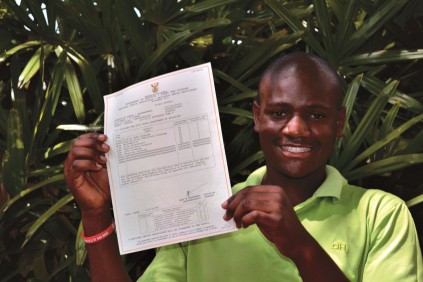 An elated Sicelo Khumalo of Matamzana Dube High School received distinctions in all his subjects