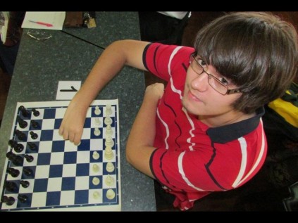 Ryan Coetzee makes the first move at the uThungulu Rapids Open Rated Chess Tournament on Saturday