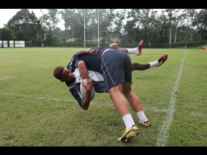 Piet Pieterse put a huge hit in on Ayabonga Ntuli during the final trials game on Thursday at the Empangeni Rugby Football Club PHOTOS: Richard Springorum