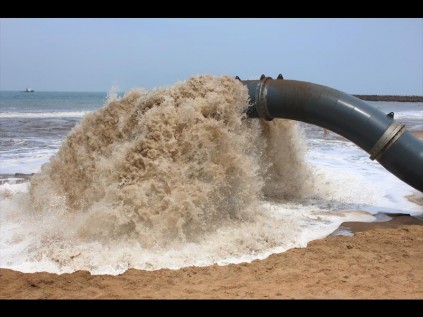 The sand and water mix being deposited on the beach just north of Alkantstrand