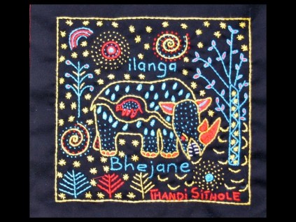 The stamp design depicts a Rhino pregnant with new life. She is browsing in an enchanted forest where all the elements are brought together. The minature stamp sheet and commemorative envelope will be published this month.
