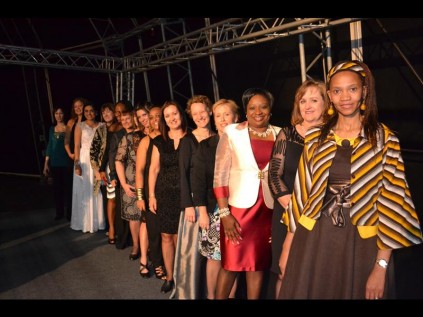 Liepollo Pheko, Babara Mommen, Judith Nzimande and Chantal McNally stand together with the finalists of the evening