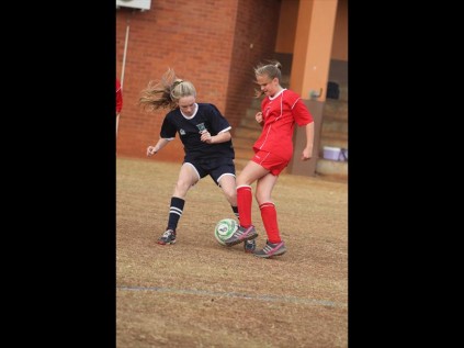 Erin Armstrong of Grantleigh and Chantelle Souchen of Heuwelland battle for ball possession during the girls' U13A matchPHOTOS: Richard Springorum