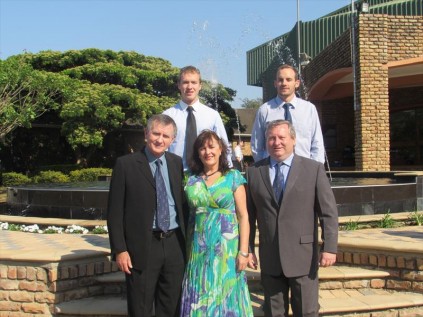 In front of the school's new fountain are (back) Warren and Gareth Grant; (front) Fred and Renette Grant with Shaun McMurtry