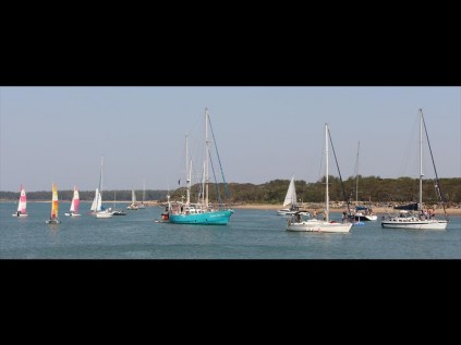 A colourful sight as the fleet surrounds the Commodore's barge PHOTOS: Dave Savides