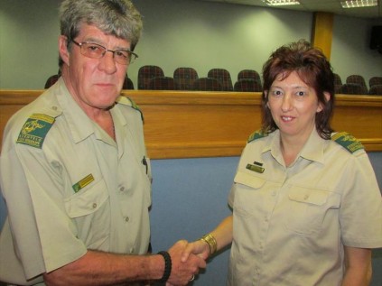Walter Emmerson (Ezemvelo KZN uMhlathuze Marine Chairperson) congratulates Mienks Emmerson (uMhlathuze Marine Secretary) for seven years of service