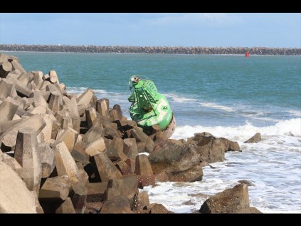 This buoy broke loose in the harbour and washed onto the dolosse at the short pier, next to the helipad