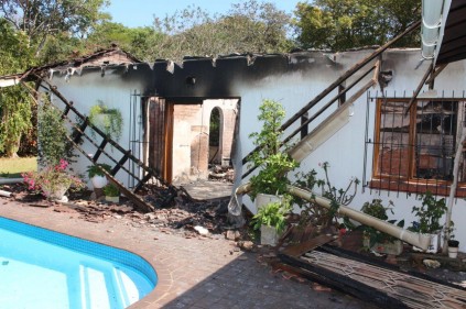 The house where the bodies of the Meerensee yachting couple were found after a fire gutted their home on Friday evening after suspected foul play PHOTO: Dave Savides