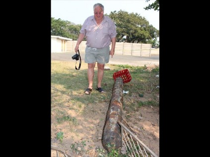  Local historian Dr JC van der Walt, who has published numerous articles on the Lake Mzingazi RAF Catalina base, inspects the objects recovered from the dry lake bed