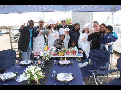 Event MC Alwin Nathaniel with the braai master champions, the Seeff team - Jesse le Roux, Juanita Koekemoer, Christo Alkers, Catherine Chetty, Kerry Baldwin, Shelly Olivier, Elaine and Sven Chetty; (front) Liam and Will Chetty
