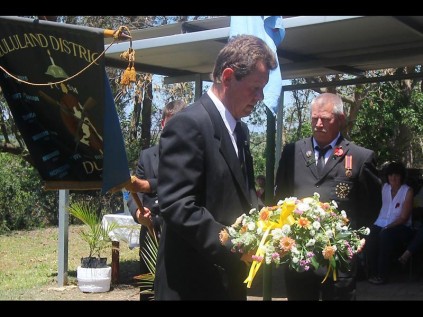 Bruce Henley lays a wreath on behalf of the Fort Pearson Shellhole