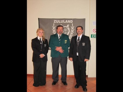 Father and daughter Lelani and André Labuschagne of the Richards Bay Ski Boat Club pose with Zululand Deep Sea Angling Association Chairman Phillip Marx (middle) after receiving their Zululand colours