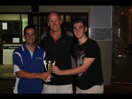 Winning captains Denzil Lohrmann (Baybrick) and Alex Tullekin (ARS Plant Hire) receive the trophy from Mannie Brockman (main sponsor – McCarthy Toyota)