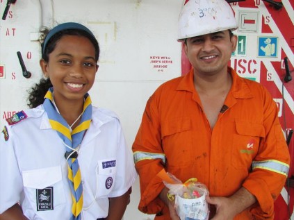 Jenae Govender hands over a mug filled with goodies to sailor Udkarsh Gahtori last Wednesday