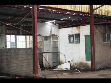 A once busy workshop has been stripped of power cables, air-conditioning units and all its tools, leaving behind remnants of what was once a thriving landing strip