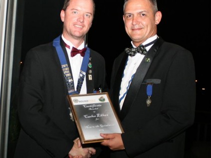 Carlos Ehlers, who will become Round Table Area Chairman for 2015, receives the ‘Nose to the Grindstone’ award for his hard work over the past year