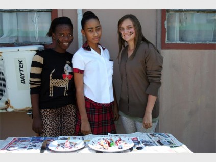 Thandeka Mthethwa, Karnita van der Byl and Danica Pieterse present their colourful dish