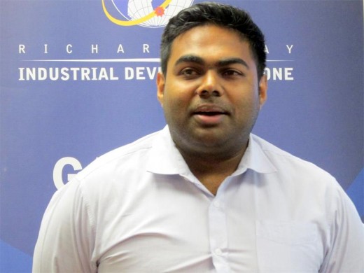 ProStar Director Vergan Kumar introduces his company's evolving paint product at the RBIDZ signing ceremony