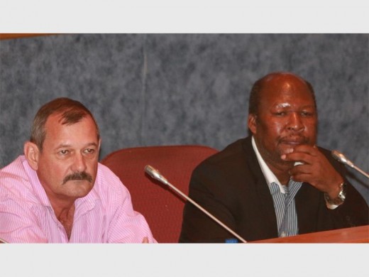 Chief Whip Manie Lourens and the Cllr Mbatha listen to the debate over the motion calling for the mayor be suspended from Tuesday’s Council meeting owing to media statements that 'brought the City into disrepute'