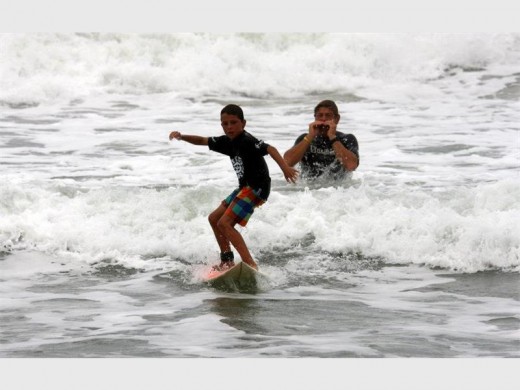 Bend your knees, Thomas! Fred le Roux gives some encouragement to a young student