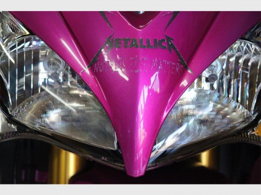 On the nose of Kym's bike is the Metallica logo and underneath it the title of her and her husband's wedding song, Nothing Else Matters
