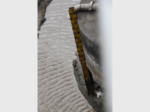 The St Lucia Estuary measuring stick became completely exposed as winds in excess of 100km/h blew the water north PHOTO: Tamlyn Jolly