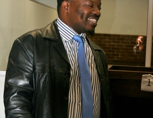 Top cop with a reason to smile - investigating officer Major Mncube of the Directorate of Priority Crime Investigation