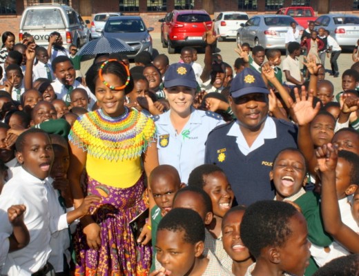 Sthe Gazu (Syathuthuka Welfare Organisation), Captain Debbie Ferreira and W/O Aroo Mathonsi with pupils of Sitholinhlanhla Primary School during a Child Protection Week commemoration event in Mzingazi