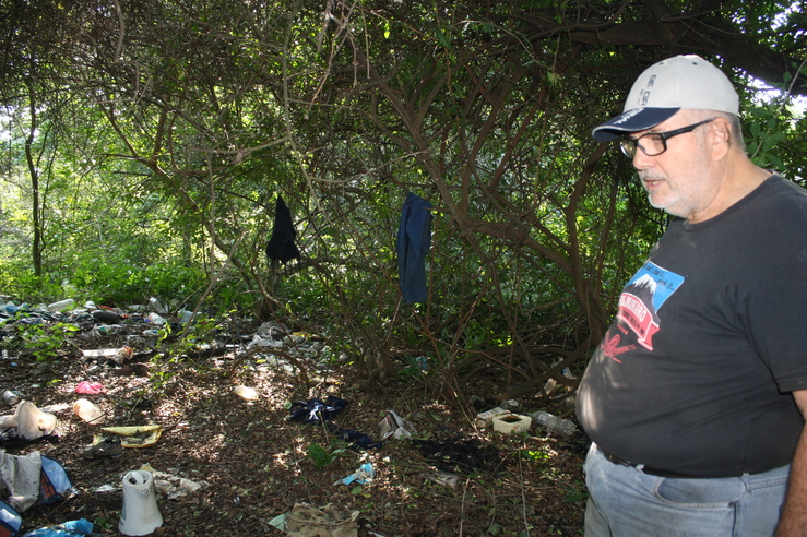Donald Pittendrigh inspects one of the many informal settlements inside the greenbelt area