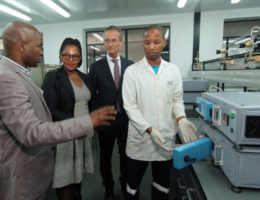 SGS Coastal Manager for Energy Minerals Sandile Buthelezi, RBCT CEO Nosipho Siwisa-Damasane, SGS SA COO Fred Herren and SGS lab analyst Henry Nsweli enjoy a tour of the facility