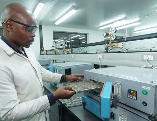 Lab analyst Xolani Sithole shows how coal sampling is done