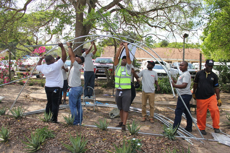 Photo: V Demont Coca Cola Bottling South Africa (CCBSA) donated the irrigation system for the Amangwe Village garden in 2005 and returned this week to donate two vegetable tunnels to boost quality and production