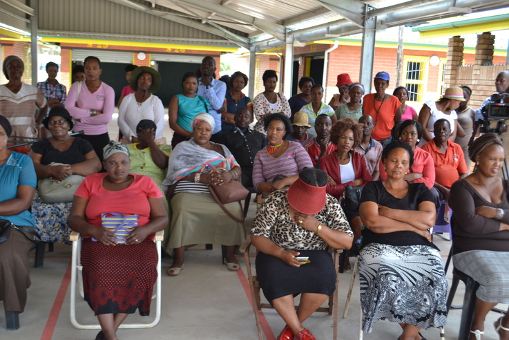 Exuberant eNseleni traders listen to the Mayor's speech as he outlines the City's expectations of owners of the trading stalls