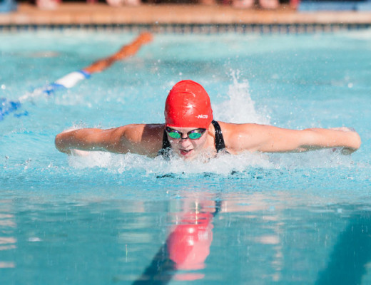 Sharon Crous flies through the water during the butterfly heat